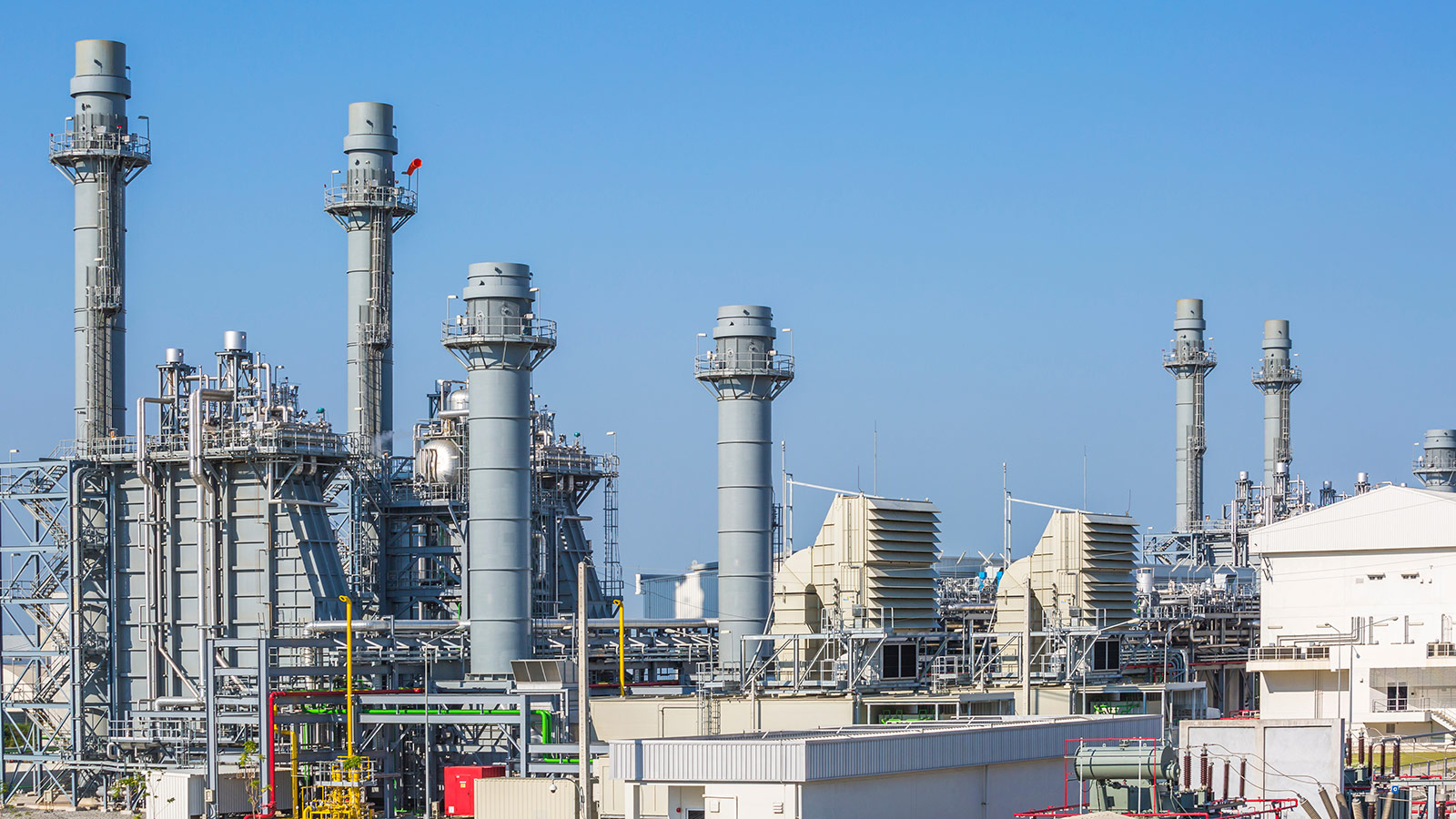 Natural gas power plant with gas turbines and industrial process equipment. Natural gas power plant with gas turbines and industrial process equipment.